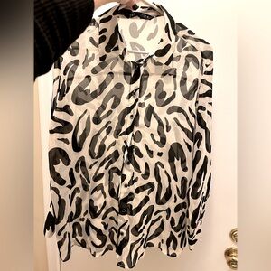 Zara black and white sheer blouse.